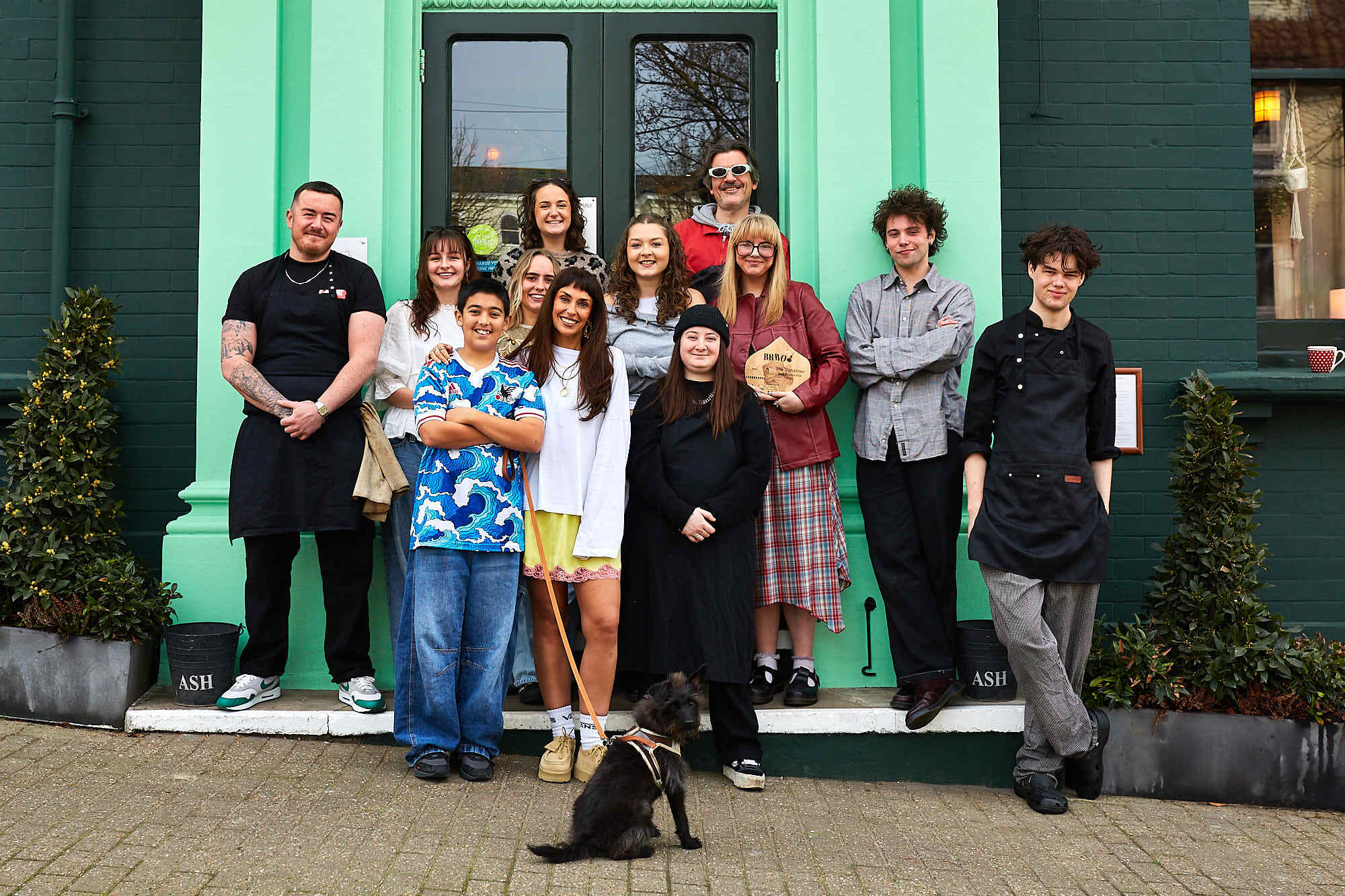 the team at The Signalman in Brighton. Celebrating the accolade of best Brighton Pub. Green facade. Located near to London Road station and Preston Circus.