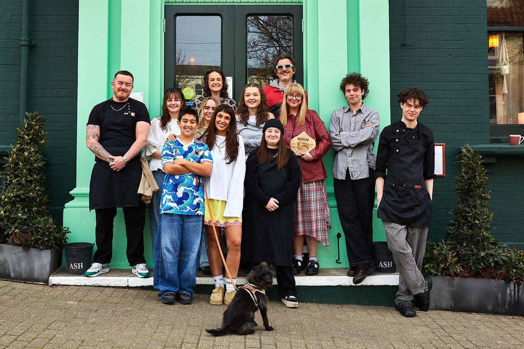 the team at The Signalman in Brighton. Celebrating the accolade of best Brighton Pub. Green facade. Located near to London Road station and Preston Circus.