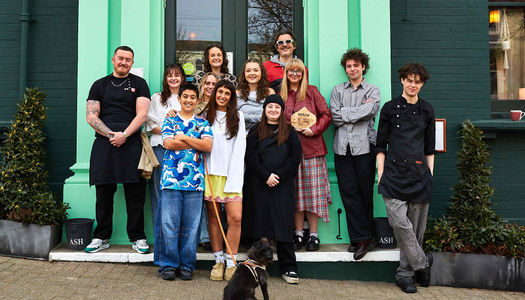 the team at The Signalman in Brighton. Celebrating the accolade of best Brighton Pub. Green facade. Located near to London Road station and Preston Circus.