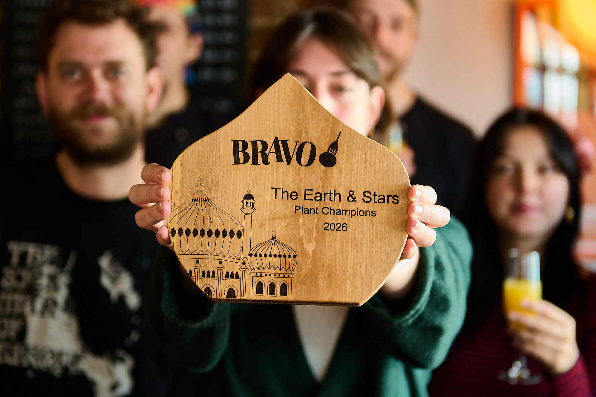 The Earth and Stars Pub. Winner of Plant Champions category in the 2026 BRAVO Awards. Picture of the team holding thr trophy.