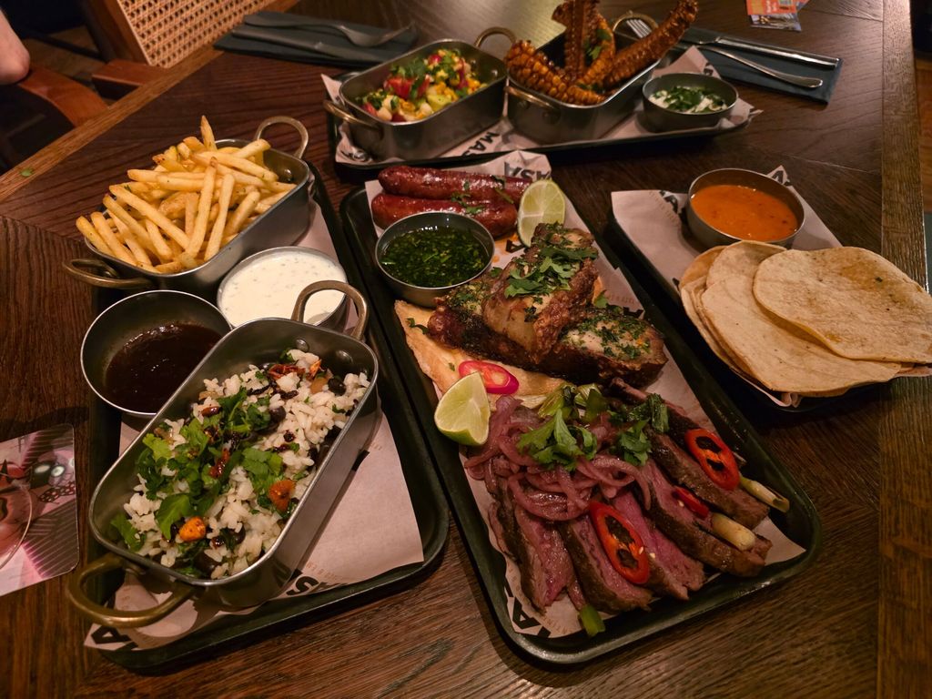 over head shot of table laid out with platter of mexican food