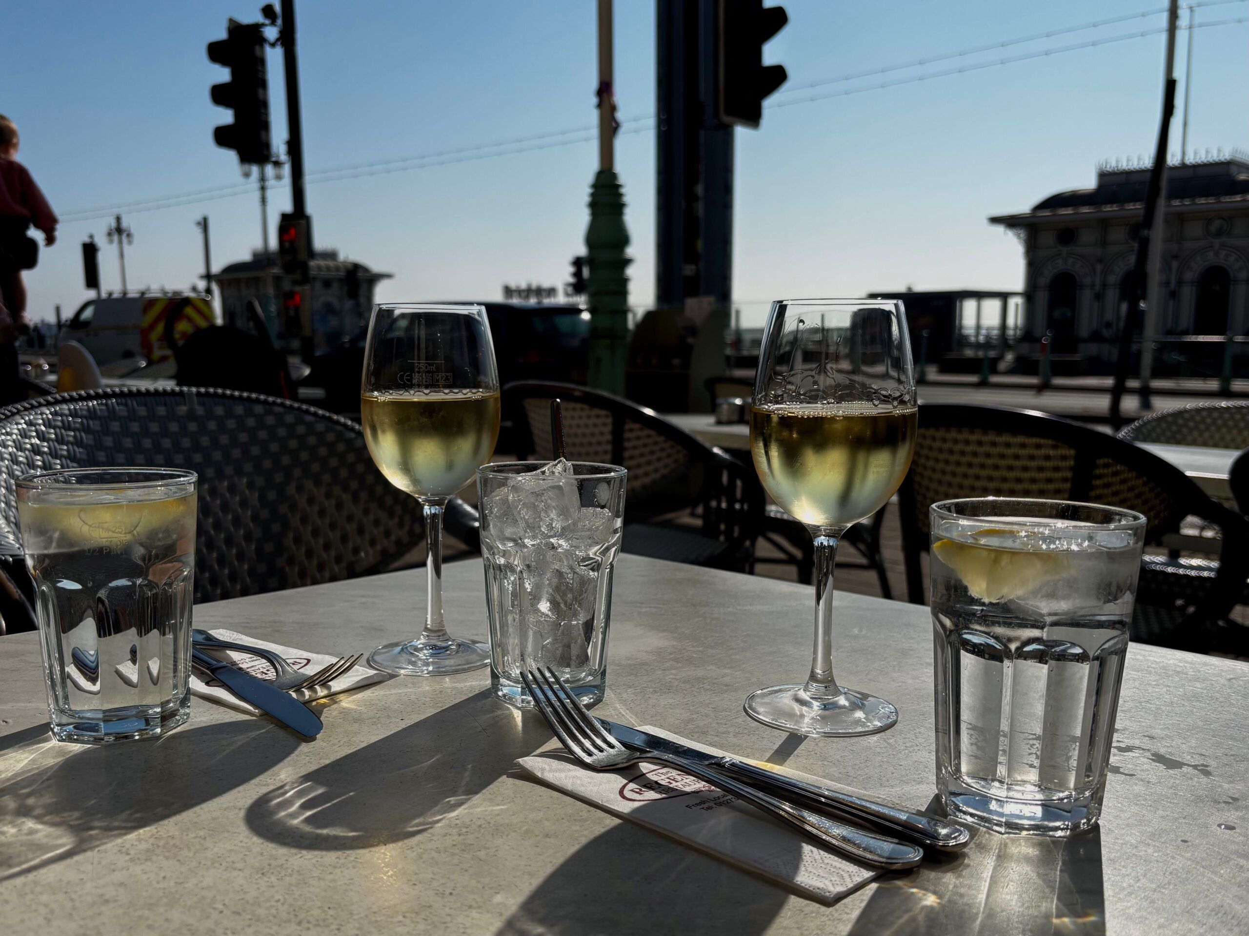 two glasses of Pinot Grigio served on the outdoor table at Regency restaurant