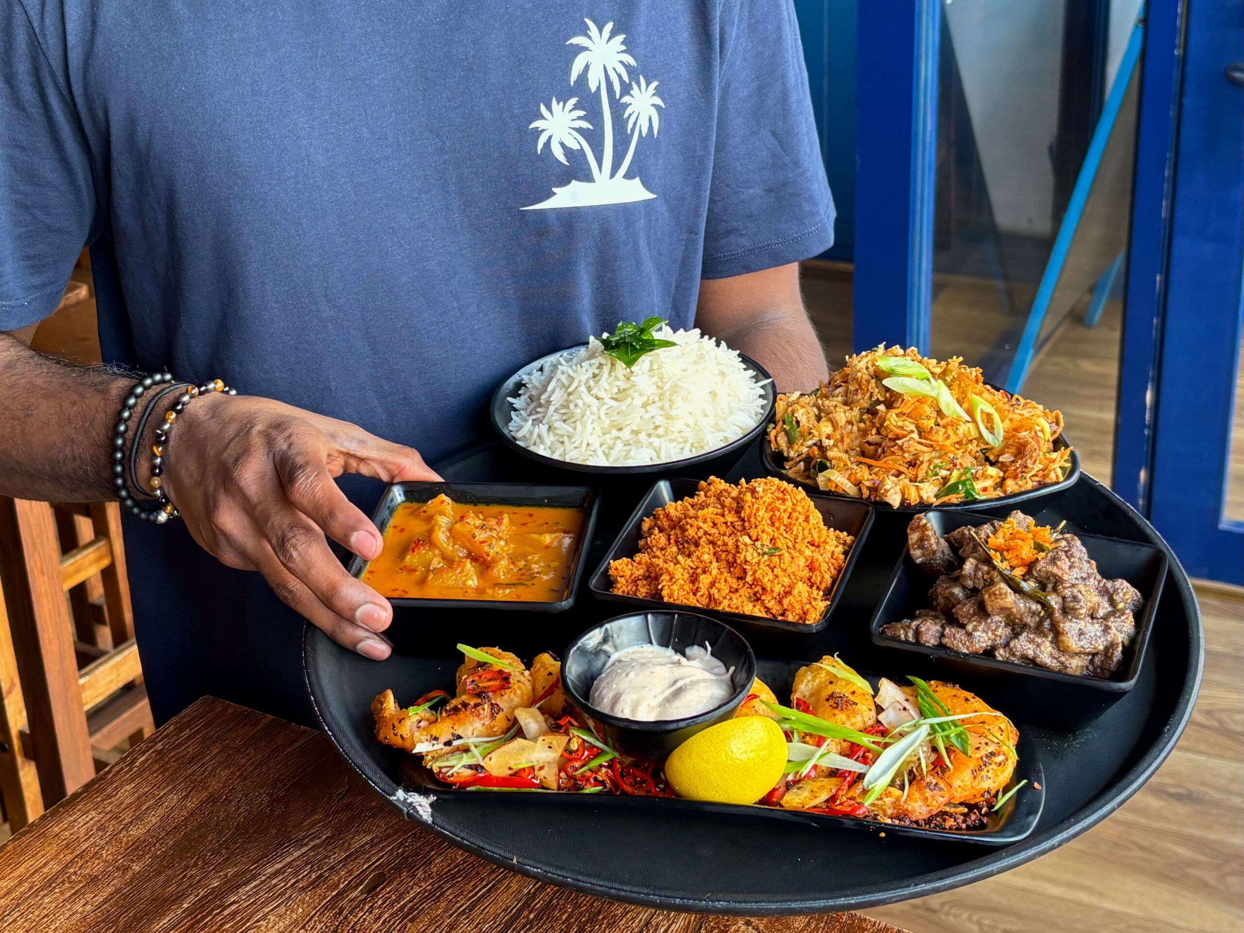 tray with various sri lankan dishes