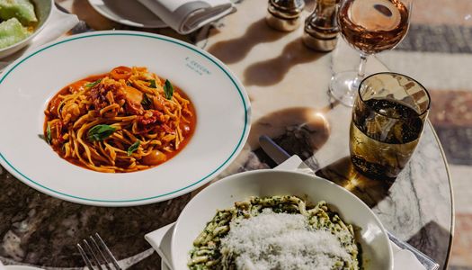 a plate of colourful tomatoes and pesto pasta at Cecconi's in Brighton. presented with nice tableware and the brand Cecconi's. Part of our Italian restaurant guide to Brighton