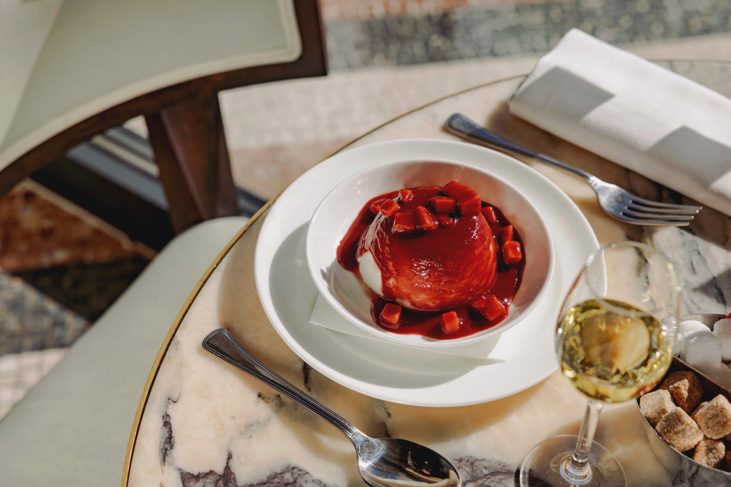 Panacotta dessert with fruit. Placed on a circular table