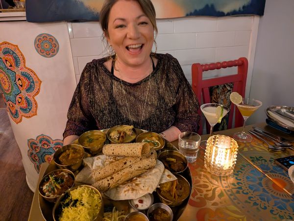 Brittany holding thali platter