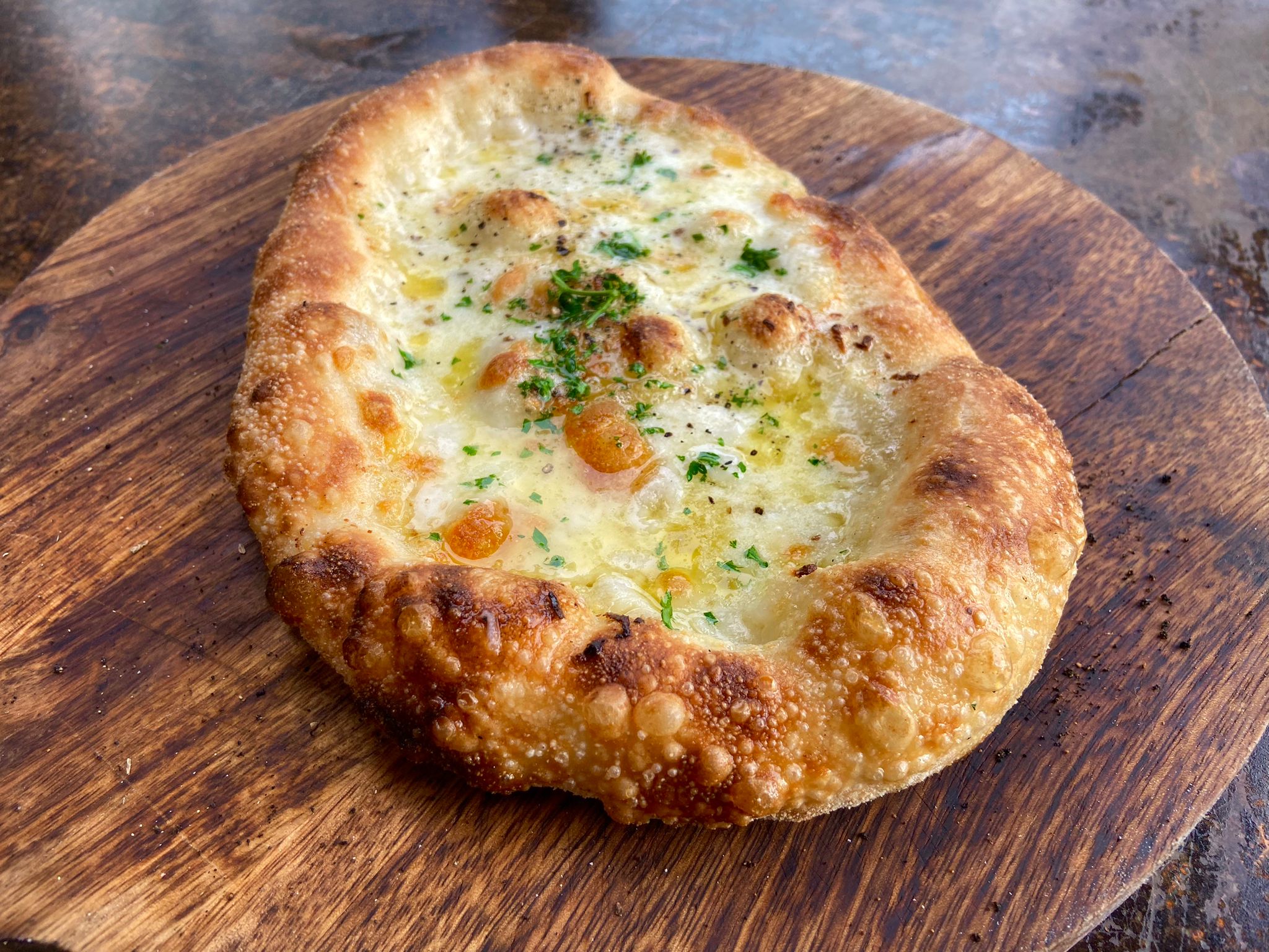 Mozarella and garlic pizza at Wild Flour Pizza