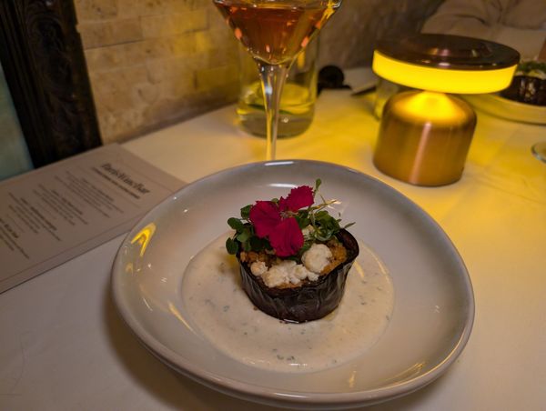 creamy aubergine complemented by salty feta, accompanied by lightly spiced cumin yoghurt