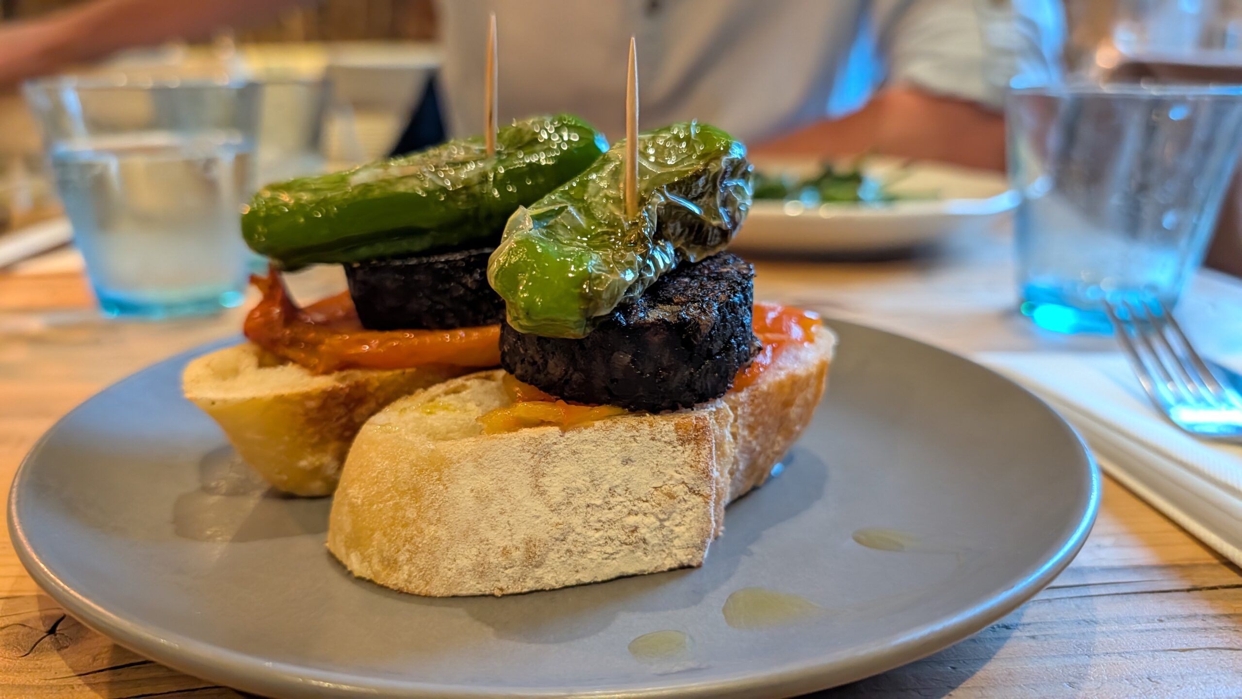 morcilla served with pepper on bread