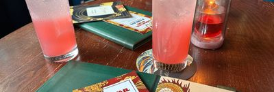 two blossoms gin drinks on the table