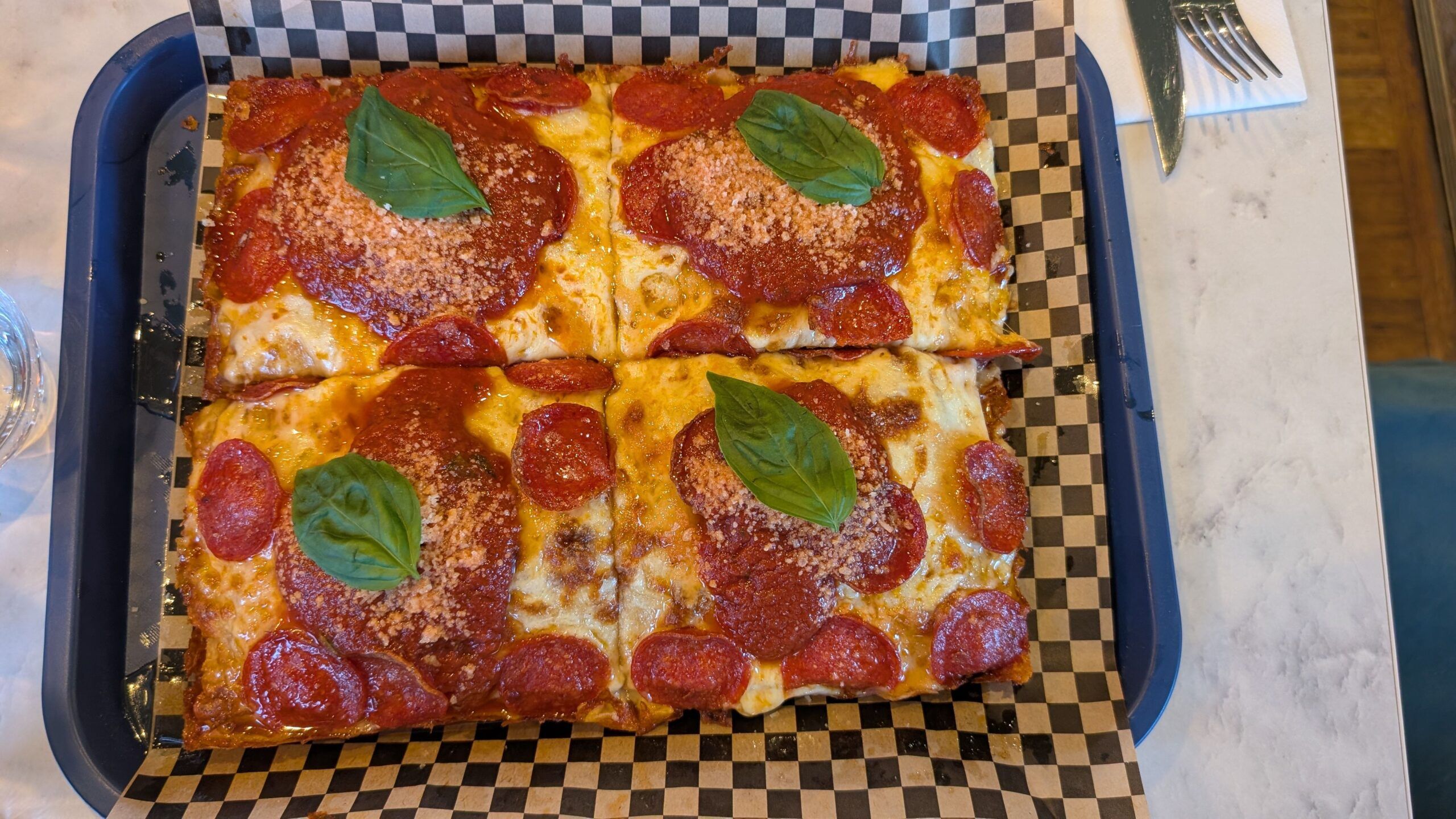 close up shot of Detroit pizza
