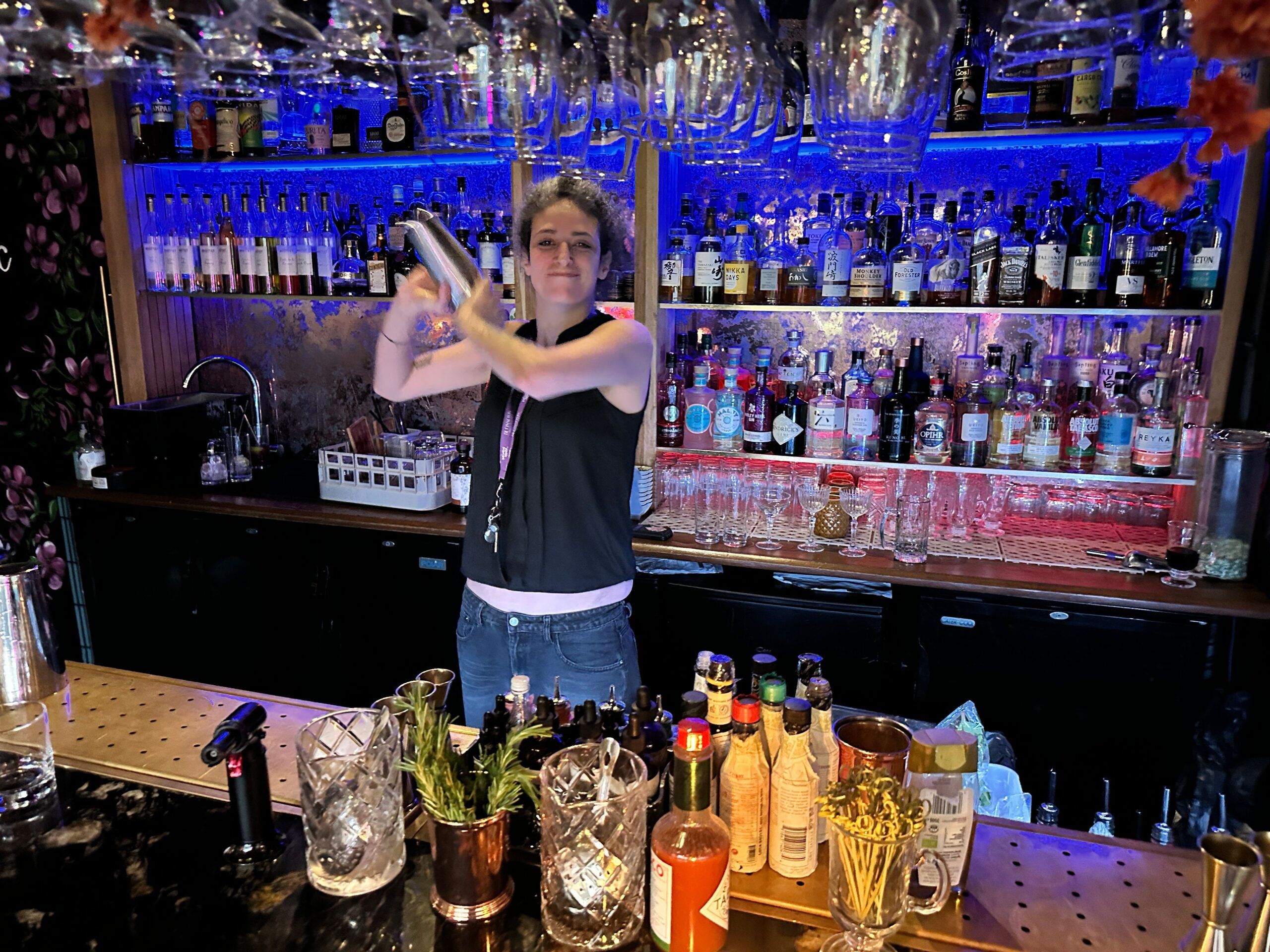 Sarah preparing cocktails at Blossoms