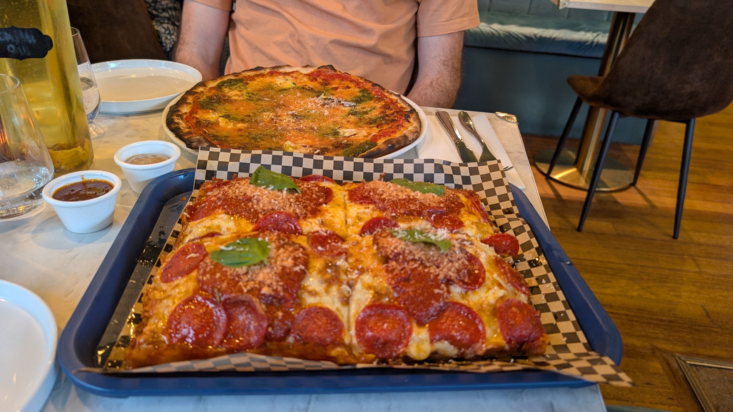 two type of pizzas on the table including Just Goat Serious’ on a Romano base, and a ‘Pepperoni’ Detroit-style pizza.