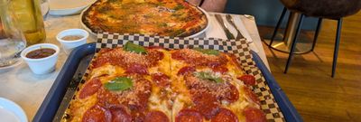 two type of pizzas on the table including Just Goat Serious’ on a Romano base, and a ‘Pepperoni’ Detroit-style pizza.