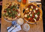 over head shot of two vegan pizzas at Purezza