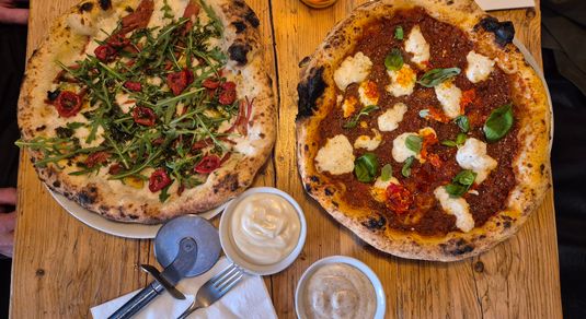 over head shot of two vegan pizzas at Purezza