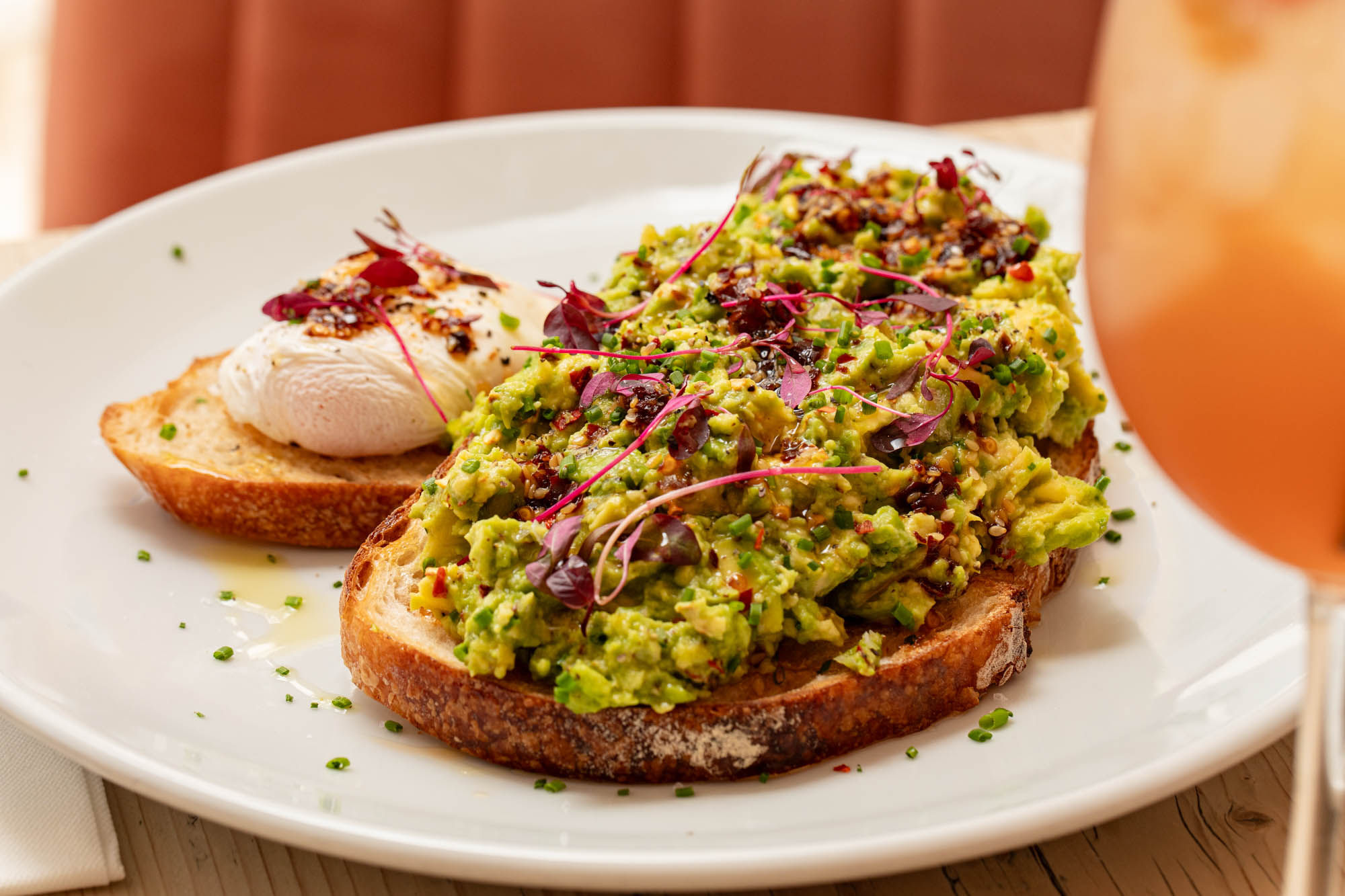 close up shot of the avocado toast served with bloody mary