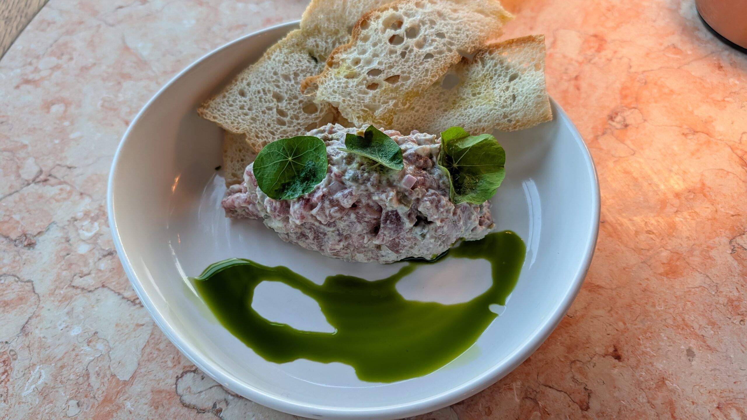 tuna tartare served with peices of bread