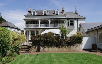 exterior shot of the Wingrove House and their beautiful garden