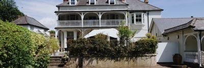 exterior shot of the Wingrove House and their beautiful garden