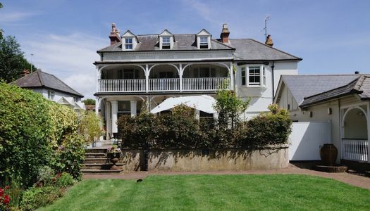 exterior shot of the Wingrove House and their beautiful garden