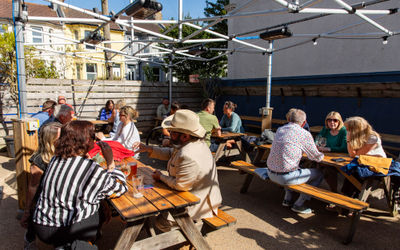 The Westbourne - exterior shot of the people in the garden