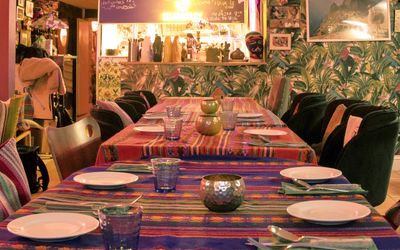 the interior of Lima Nikkei in Brighton. Located on Madeira Drive. Peruvian table cloths and soft furnishings