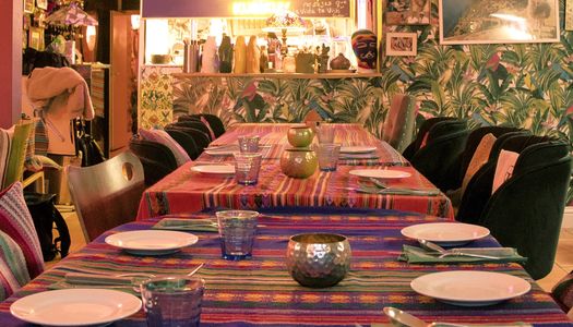 the interior of Lima Nikkei in Brighton. Located on Madeira Drive. Peruvian table cloths and soft furnishings