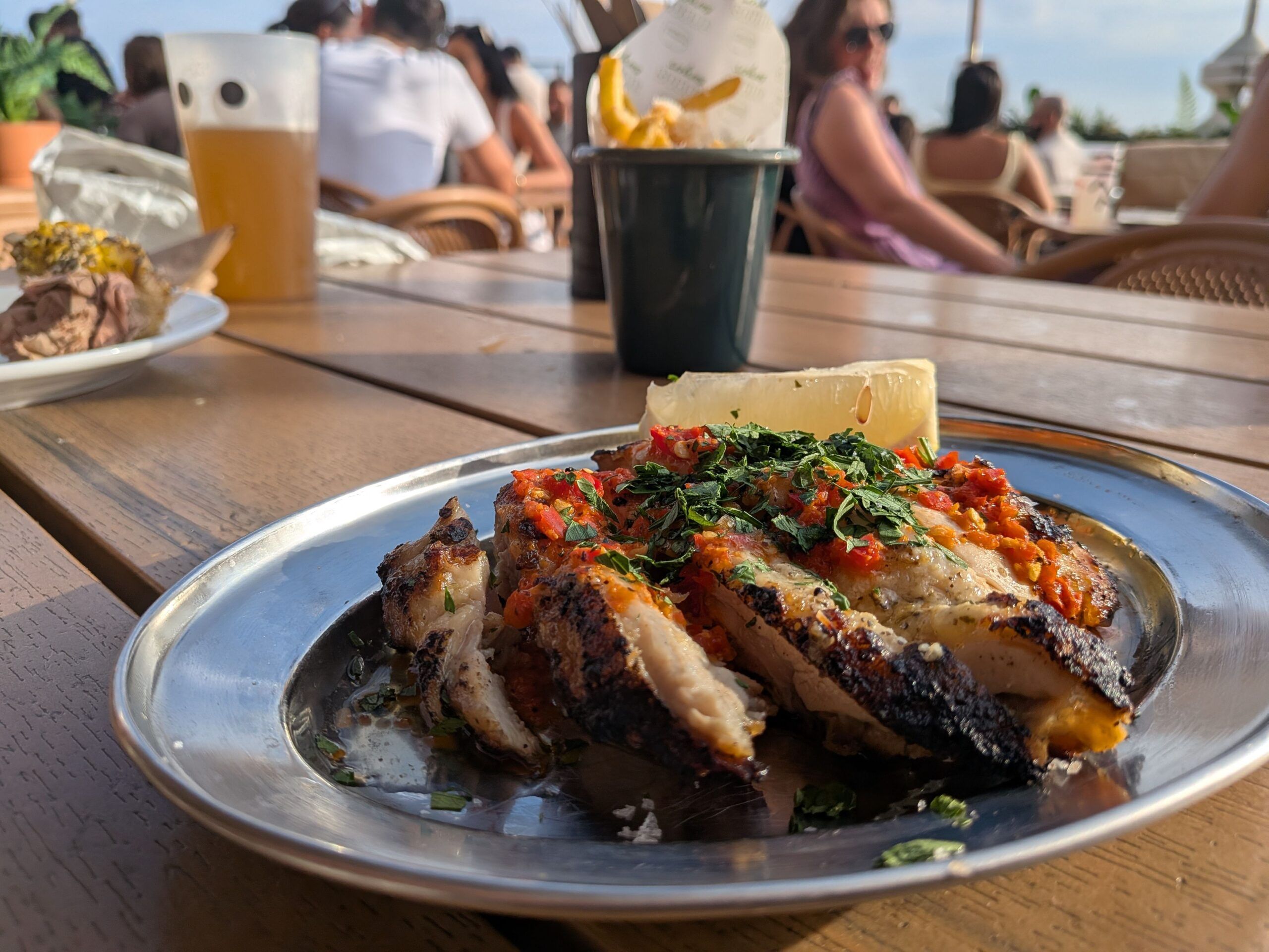 half grilled chicken from Churrasco