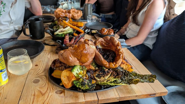 table laid out with couple of roast at Embers Brighton