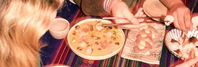a table of diners enjoying Peruvian Food