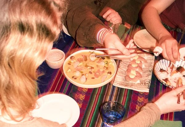 a table of diners enjoying Peruvian Food