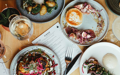 an over head shot of the dinner menu with dishes at the Fig in Rye