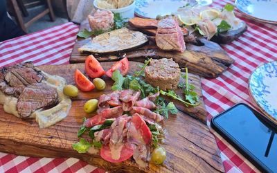 a selection of cured meats on a platter at Tavulin Morestina on Sutivan seafront