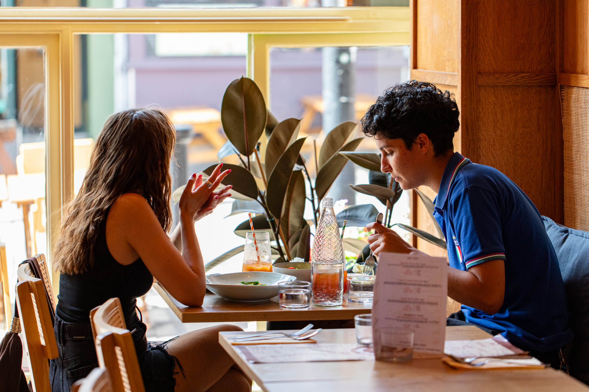 two people dining at the Tamarind at the window table
