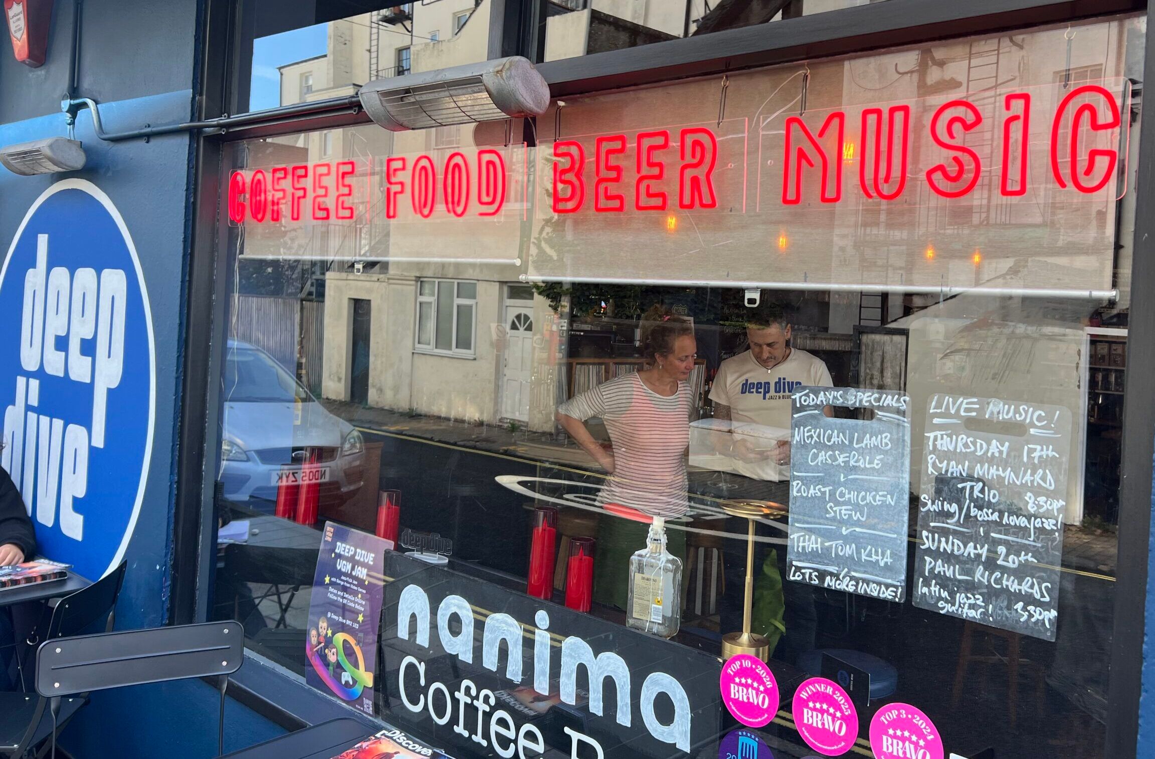 the facade of Deep Dive Bar in Brighton. Coffee - Food - Beer - Music