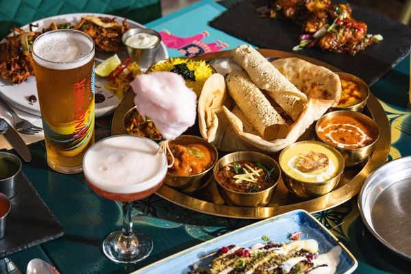 Indian Summer - table laid out with food trays and cocktails