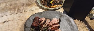 steak served on the grey plate at the Embers Brighton